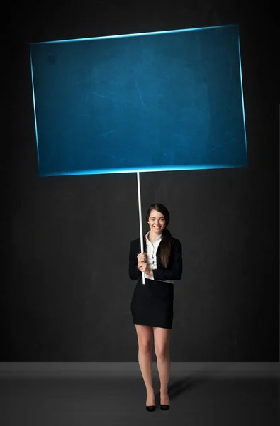 Businesswoman with blue board — Stock Photo, Image