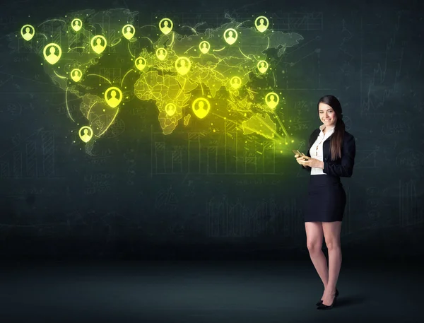 Businesswoman in office with tablet and social network world map — Stock Photo, Image