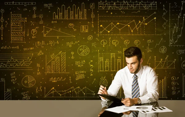 Businessman with diagram background — Stock Photo, Image