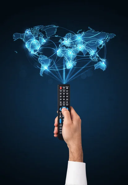 Hand with remote control, social media concept — Stock Photo, Image