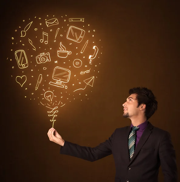 Businessman with a social media balloon — Stock Photo, Image