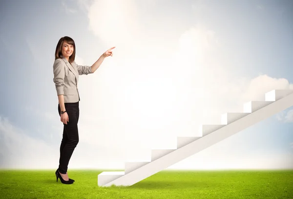 Business person climbing up on white staircase in nature — Stock Photo, Image