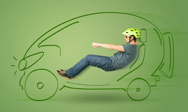 Homme conduit une voiture électrique dessinée à la main écologique — Photo