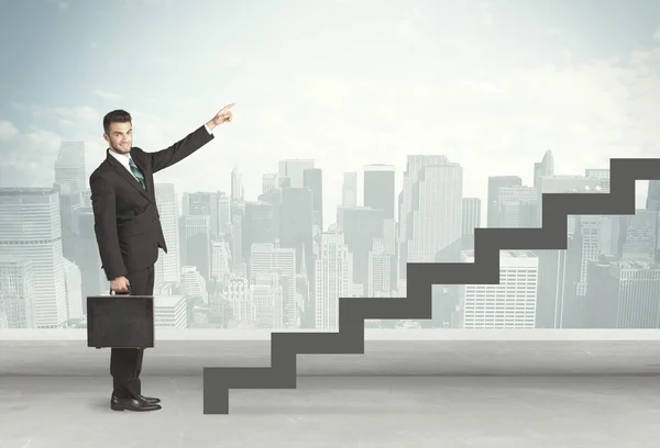 Business person in front of a staircase — Stock Photo, Image