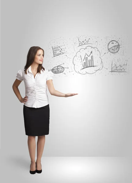 Business girl presenting hand drawn sketch graphs and charts — Stock Photo, Image