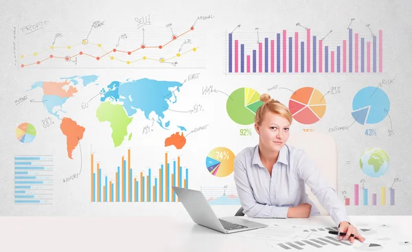 Business woman with colorful charts — Stock Photo, Image