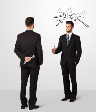 bir silah saklıyor işadamı