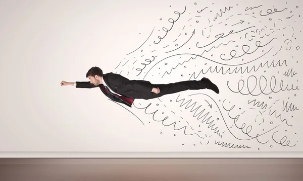 Business man flying with hand drawn lines comming out — Stock Photo, Image