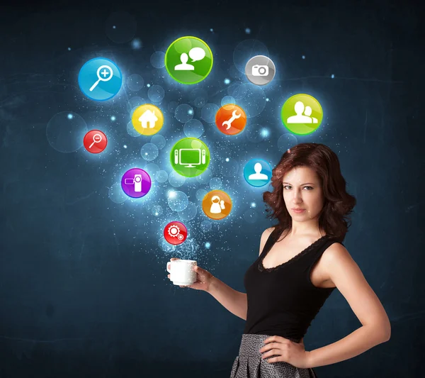 Businesswoman holding a white cup with setting icons — Stock Photo, Image