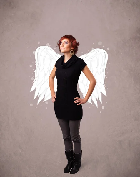 Schattig meisje met engel geïllustreerde vleugels — Stockfoto