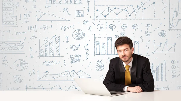 Businessman with diagram background — Stock Photo, Image