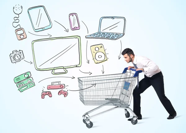 Businessman with shopping cart — Stock Photo, Image