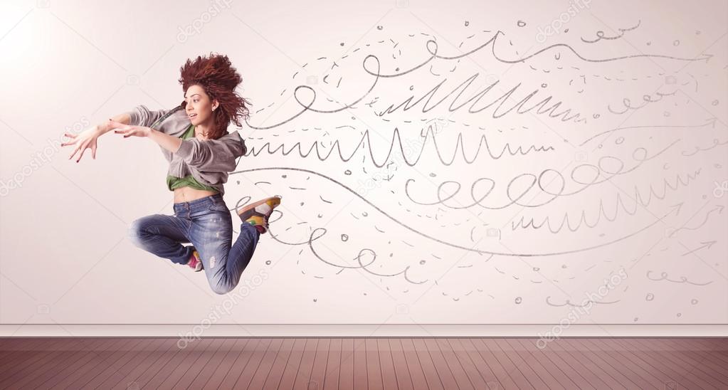 Pretty woman jumping with hand drawn lines and arrows come out