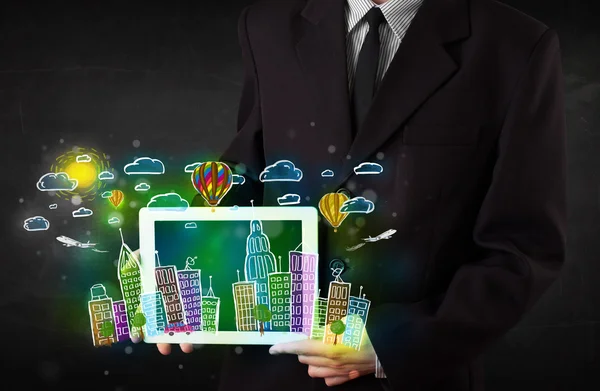 Young person showing tablet with hand drawn cityscape — Stock Photo, Image