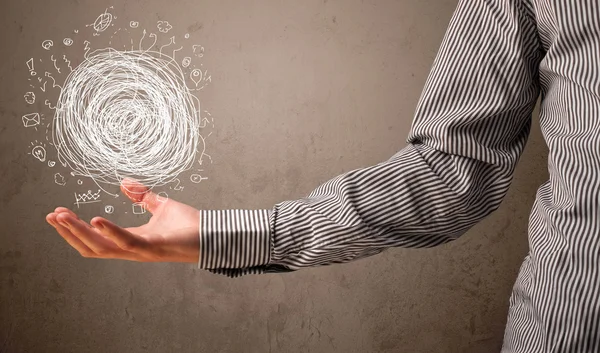 Chaos-Konzept in der Hand eines Geschäftsmannes — Stockfoto