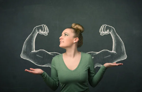 Woman with sketched strong and muscled arms — Stock Photo, Image