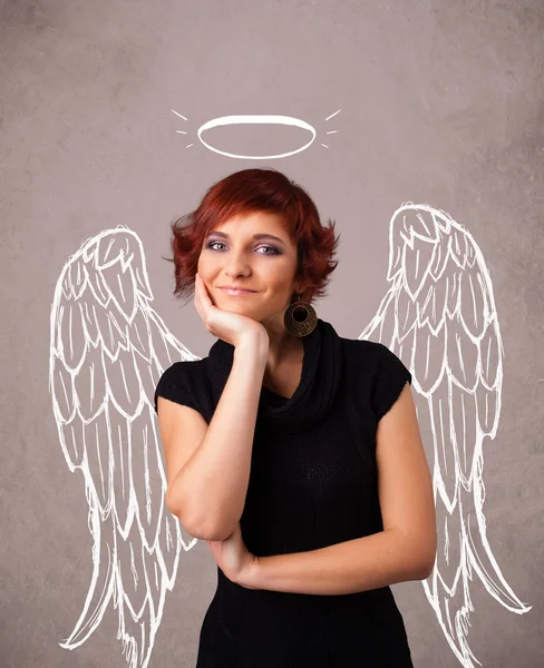 Cute girl with angel illustrated wings — Stock Photo, Image