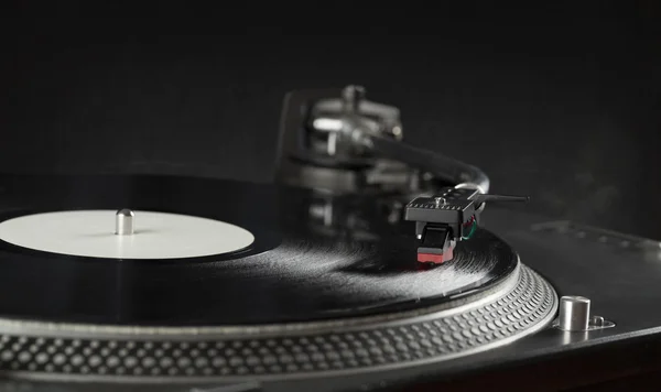 Turntable playing vinyl close up with needle on the record — Stock Photo, Image