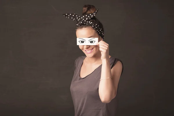 Silly youngster looking with hand drawn eye paper — Stock Photo, Image