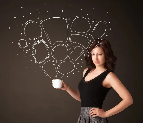 Businesswoman holding a white cup with speech bubbles — Stock Photo, Image