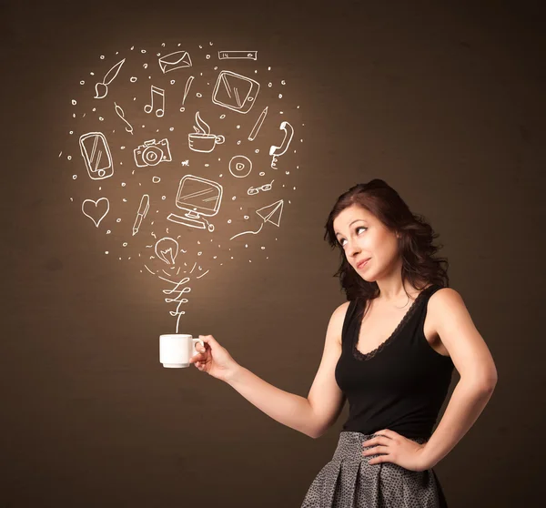 Businesswoman holding a white cup with social media icons — Stock Photo, Image