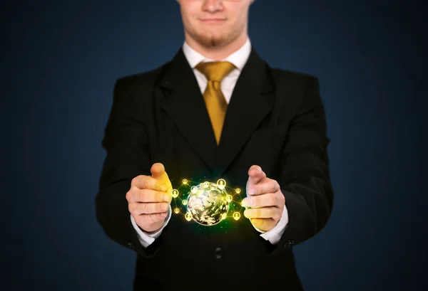 Businessman holding a social media globe — Stock Photo, Image