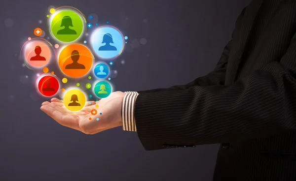 Social network icons in the hand of a businessman — Stock Photo, Image