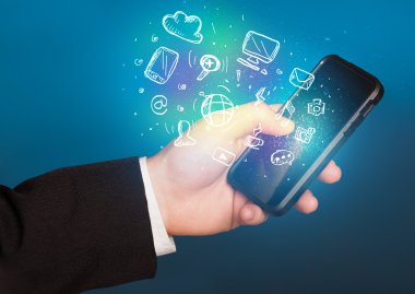 El smartphone Medya simgeler ile tutarak 