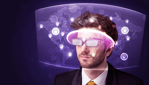 Young man looking at futuristic social network map — Stock Photo, Image