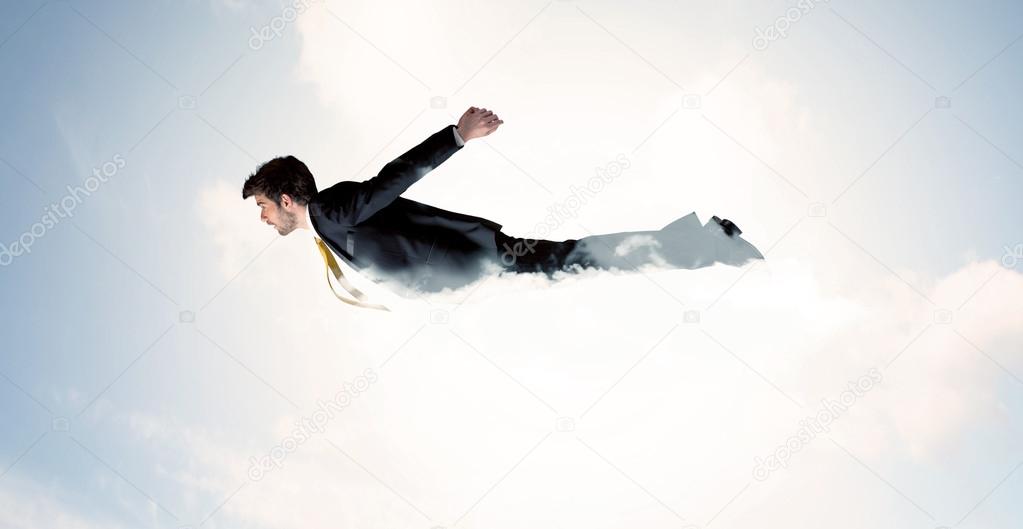 Business man flying like a superhero in clouds on the sky