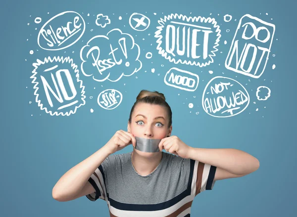 Young woman with glued mouth and thought clouds — Stock Photo, Image