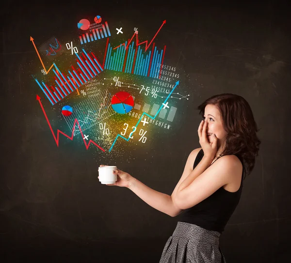 Businesswoman holding a white cup with diagrams and graphs — Stock Photo, Image