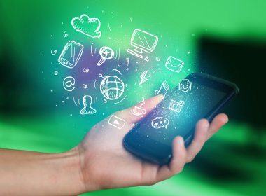 El smartphone Medya simgeler ile tutarak 