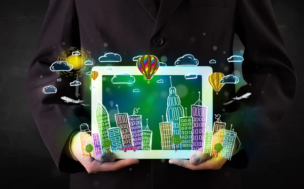 Young person showing tablet with hand drawn cityscape — Stock Photo, Image