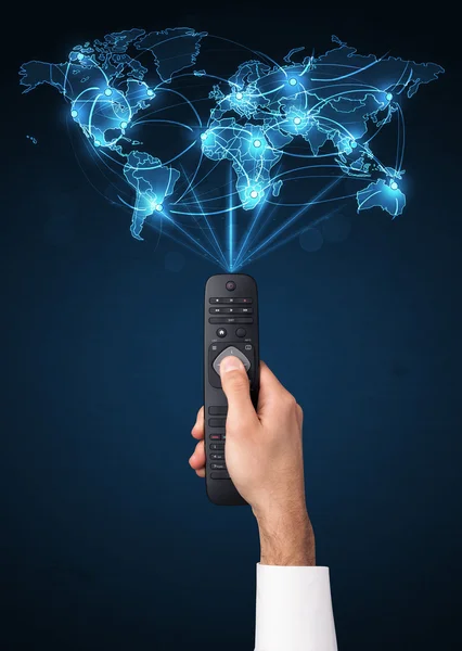 Hand with remote control, social media concept — Stock Photo, Image