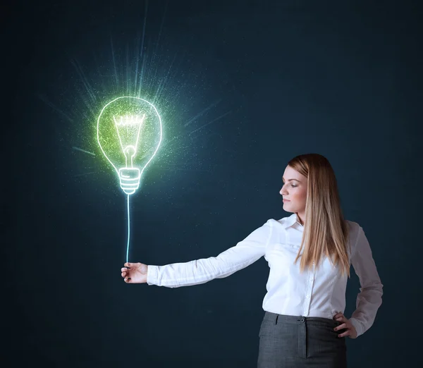 Mulher de negócios com uma lâmpada ideia — Fotografia de Stock