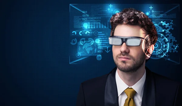 Young man looking with futuristic smart high tech glasses — Stock Photo, Image