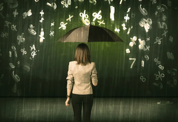 Mujer de negocios de pie con paraguas y números 3d lloviendo cono — Foto de Stock