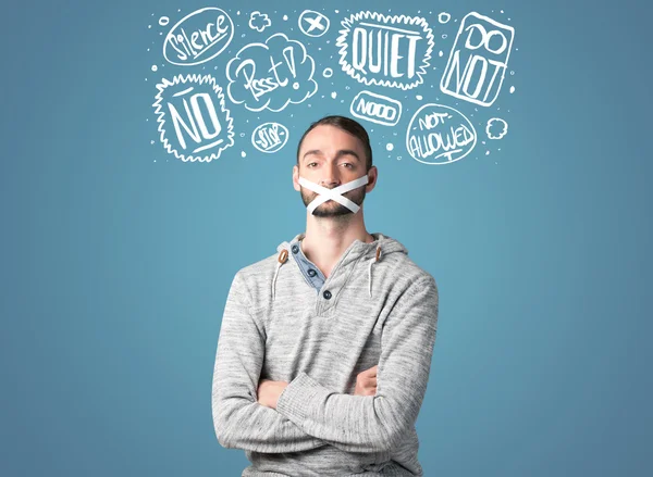 Young man with glued mouth and thought clouds — Stock Photo, Image