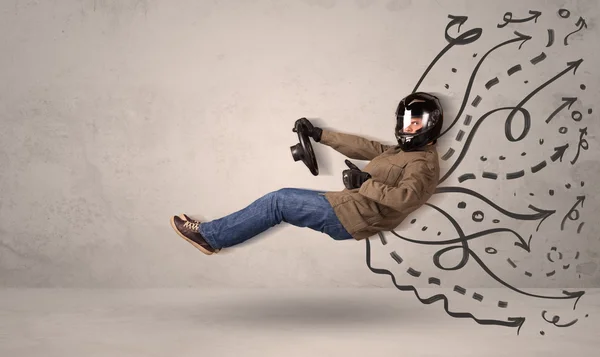 Funny man driving a flying vehicle with hand drawn lines after h — Stock Photo, Image