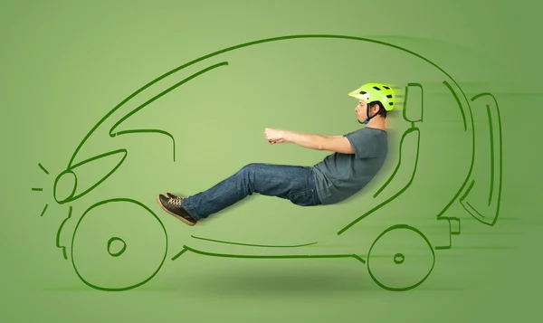 Man drives an eco friendy electric hand drawn car — Stock Photo, Image