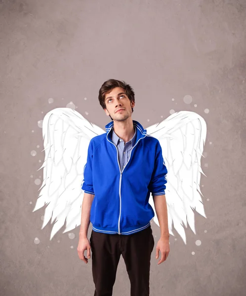 Boy with angel illustrated wings on grungy background — Stock Photo, Image