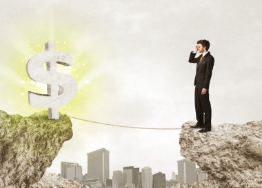 Bir dolar işareti ile rock dağda işadamı