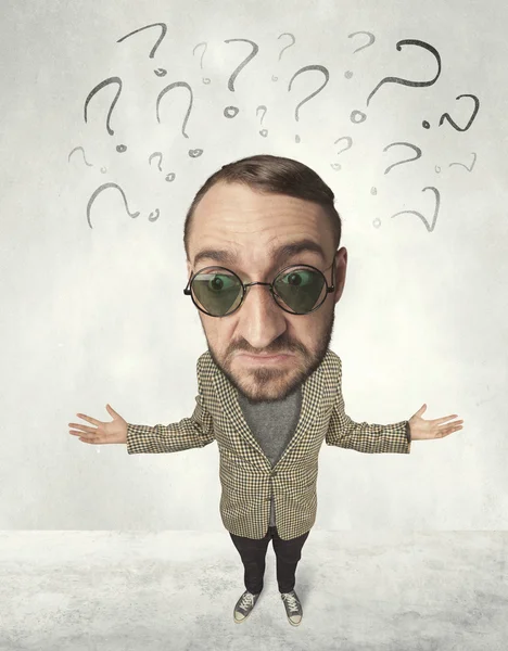 Big head person with question marks — Stock Photo, Image