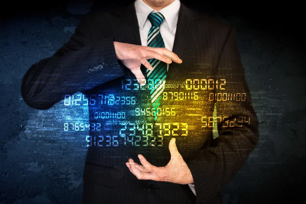 Businessman holding number cloud — Stock Photo, Image