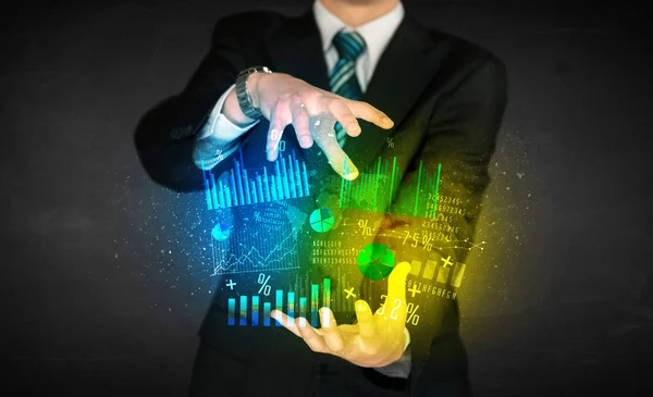 Businessman holding diagram cloud — Stock Photo, Image