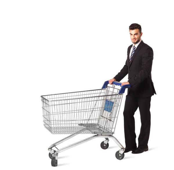 ショッピングカートを持つビジネスマン — ストック写真