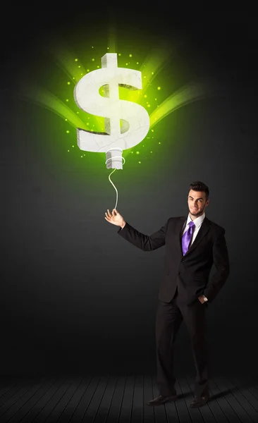 Businessman with a dollar sign balloon — Stock Photo, Image