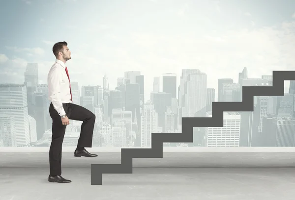 Business person in front of a staircase — Stock Photo, Image