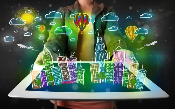 Young person showing tablet with hand drawn cityscape — Stock Photo, Image